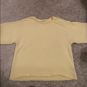 Soft yellow cropped shirt